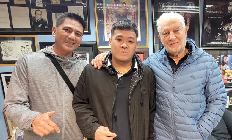 Rodney Berman with Jim Maranquil, centre, and business partner Dexter Tan.